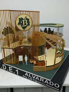 a model of a building made out of wood and metal with the letters d e 1 avarado on it