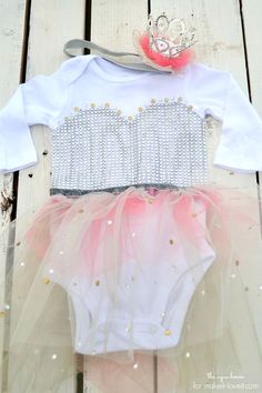 Make this simple No-Sew Princess Costume for your baby. All you need is a onesie, tulle, rhinestones, and glue. | via Make It and Love It