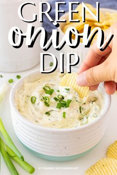 green onion dip in a white bowl with chips