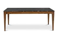 a marble top table with wooden legs and an open drawer on the bottom, against a white background