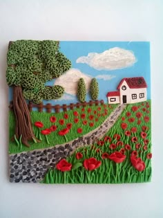 a painting on the wall of a farm with red flowers and a white house in the background