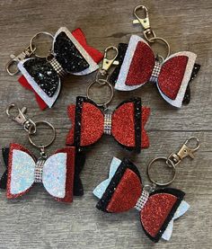 "DOLLY CHEERBOW KEYCHAINS!  Custom made triple layer MINI dolly cheerbow keychain backed with felt, your choice of glitter, chunky glitter, and rhinestone centers attached to a lobster claw keychain.  Dolly bow keychains available in any color combinations you choose to match your school colors.  This keychain bow measures 2\" by 3\".   These are Mini keychains.   As Etsy only allows for 2 custom listing options you will need to enter your specific glitter colors or chunky glitter colors in the Cheer Accessories Ideas, Diy Cheer Keychain, Diy Cheer Bow Keychain, Cheer Exercises, Acrylic Keychains Cheer, Cheer Bow Keychain, Cheer Keychain Bows, Cheerleader Keychains, Mini Keychains