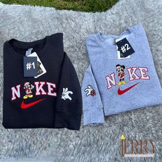 Get into the festive spirit with the Mickey and Minnie Disney Christmas Nike Embroidered Sweatshirt. This eye-catching sweatshirt is perfect for celebrating the holiday season in style. The iconic Mickey and Minnie characters are beautifully embroidered on the front, adding a touch of Disney magic to your outfit. Designed by Nike, this sweatshirt is not only fashionable but also incredibly comfortable. Made from high-quality materials, it offers a soft and cozy feel, keeping you warm during the Christmas Nike, Nike Embroidered Sweatshirt, Christmas Attire, Diy Disney Shirts, Diy Disney, Disney Things, Diy Sweatshirt, Couple Things, Disney Sweaters