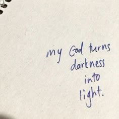 a note with writing on it that says, my god turns darkness into light