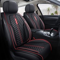 the interior of a car with black leather and red stitching on the front seats