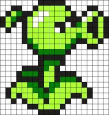 an image of the grin face in green and black pixellated to look like it has been