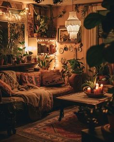 a living room filled with furniture and lots of plants