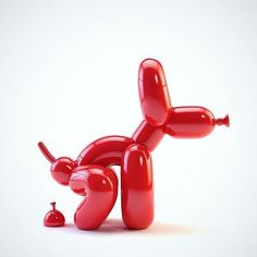 an inflatable person laying on the ground next to a red object that looks like it is falling