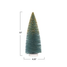 the height of a small christmas tree on a white base with gold lights and a blue tinsely top