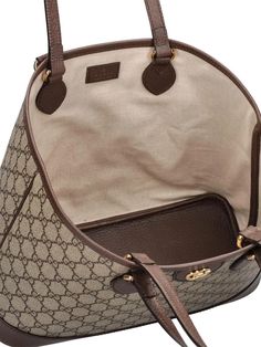 Height: 25cm Width: 31cm Depth: 13cm. Strap drop: 28.5cm. Top handle drop: 12cm. Double fixed straps. Double top handles. Logo details. All over pattern placement may vary. Gold-colored metal hardware. Leather trim. Cotton & linen lining Luxury Handheld Bucket Bag For Errands, High-end Handheld Shoulder Bag With Leather Handles, Luxury Handheld Bucket Bag For Shopping, Gucci Bucket Bag With Gold-tone Hardware, Gucci Chic Bucket Bag With Gold-tone Hardware, Gucci Bucket Bag With Gold-tone Hardware For Travel, Chic Gucci Bucket Bag With Gold-tone Hardware, Gucci Top Handle Shoulder Bag, Designer Handheld Bucket Bag With Handle Drop