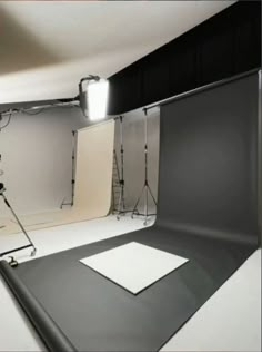 an empty photo studio with lighting equipment