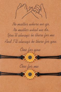 two bracelets with sunflower on them and one for me written in the middle