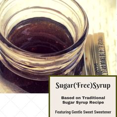 sugar free syrup in a glass jar next to a measuring cup with the word sugar free syrup on it