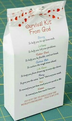 a small white box with a poem on the front and inside that says survival kit from god