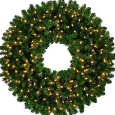 a christmas wreath with lights on it