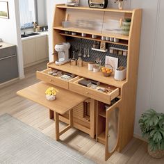 a wooden desk with drawers underneath it in a living room next to a potted plant