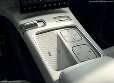 the interior of a car with buttons and controls