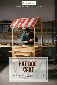 a man sitting in front of a wooden cart with the words hot dog cart on it