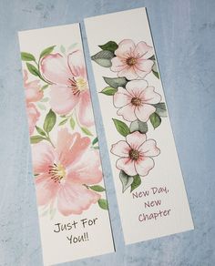 two bookmarks with pink flowers on them that say just for you and new day