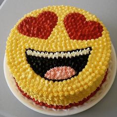 a cake decorated with yellow and red frosting