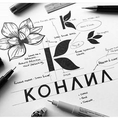 some pens and markers are laying on top of a piece of paper with the words kohana written in it