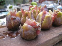 some figs that are sitting on a table