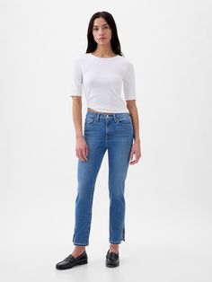 Fit: A slim, ankle-length classic.  More room than our True Skinny, but just as comfortable.  Fabric: 87% Cotton, 7% Recycled Materials, 5% Polyester.  Stretch: Stretch Jeans.  A bit of hug & a lot of hold.  Comfortable & designed to flatter.  Rise: Mid Rise Jeans.  Look: A classic five-pocket jean in medium indigo wash.  Details: Zip fly, five-pocket styling & holds-you-in front pockets.  Certain styles have raw hem or split at hem.  Responsibly Made: This pair of jeans is part of our water-sav Gap Stretch Jeans For Spring, Fitted Gap Jeans For Everyday Wear, Fitted Gap Jeans For Everyday, Everyday Fitted Jeans By Gap, Gap High Rise Fitted Jeans, Gap Fitted High Rise Jeans, Gap High-rise Fitted Jeans, Gap Fitted High-rise Jeans, Mom Clothes