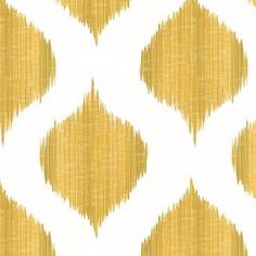 an abstract yellow and white pattern on fabric