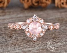 Exquisite Rose Gold Rings With Halo Design, Pink Round Halo Wedding Ring, Pink Round Halo Ring For Wedding, Fine Jewelry In Pink Gold With Halo Setting, Pink Gold Halo Setting Ring, Rose Gold 14k Wedding Crystal Ring, Pink Gold Rings With Halo Setting, Pink Gold Wedding Jewelry With Round Cut, Pink Gold Jewelry For Wedding With Round Cut