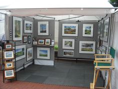 an open tent with pictures on the walls