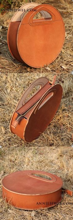 an old suitcase sitting on the ground in some dry grass and straw, with another empty bag next to it