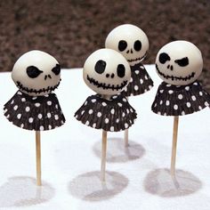 there are four cake toppers that look like jack skellings