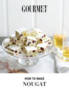 an advertisement for gourmet magazine with food and drinks on the table in front of it