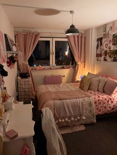 a bed room with a neatly made bed next to a window