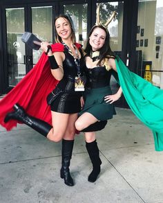 two women dressed up as superheros posing for the camera