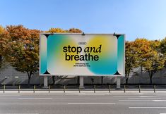 a large billboard with the words stop and breathe on it