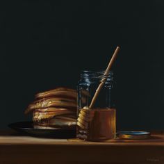 a painting of pancakes and honey in a jar with a spoon on the table next to it