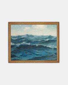 an oil painting on canvas of blue ocean waves in gold frame, hanging on the wall