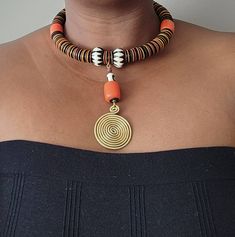 100% handcrafted using African beads. The necklace makes a perfect gift to loved ones. It will make you look bold and beautiful. **Buy multiple items and pay shipping for 1 item only.The rest ships free. More neckleces here; https://www.etsy.com/shop/TribalTess?ref=seller-platform-mcnav&section_id=21306083 Back to my shop; https://www.etsy.com/shop/TribalTess?ref=seller-platform-mcnav African Trade Bead Jewelry, African Beaded Necklace, African Inspired Jewelry, Large Bead Necklace, African Jewellery, African Beads Necklace, Artsy Jewelry, Fancy Jewelry Necklace, Stone Accessories