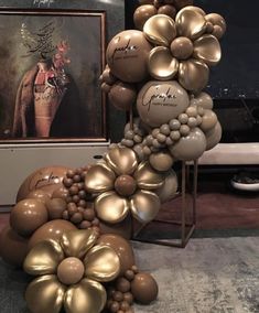 a bunch of balloons that are in the shape of flowers