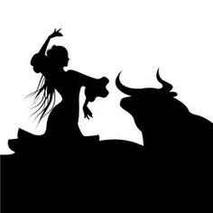 the silhouette of a woman riding a bull