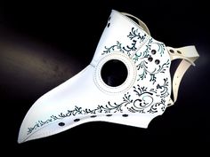 Our white plague doctor mask is intricately designed to evoke the enigmatic spirit of the past. This mask is perfect for long periods of wear as it is crafted with vegan leather, making it comfortable and breathable. White/Green Color.

Age Group/Gender - Adult/Unisex
Size/Type - One size fits all adults
Mask Color - White
Filigree Color - Green
Mask Material - Vegan Leather Plague Doctor Costume Women, Plague Doctor Cosplay, Beak Mask, Plague Doctor Costume, Plague Mask, Plague Doctor Mask, Thank You Wishes, Doctor Costume, Doctor Mask