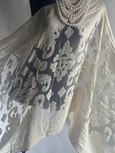 ith this Elegant Floral Sheer Shawl, a lightweight and versatile accessory perfect for every occasion. Designed with a delicate floral pattern and a breezy, sheer look, this large-sized shawl is ideal for multiple uses, such as a chiffon veil, head wrap, or classic shawl. The silky feeling adds a touch of sophistication to any ensemble. Key Features: *Elegant Floral Design: A charming floral pattern enhances the sheer, feminine look. *Lightweight and Large Size: Perfect for layering, dancing, or wearing as a statement piece. *Versatile Usage: Can be styled as a shawl, chiffon veil, head wrap, or dancing accessory. *Perfect for Performances: Ideal for belly dance, stage performances, tribal dancing, or expressing your artistic beauty. *Silky Feel: Crafted with a silk-blend material for an e Chiffon Veil, Sheer Shawl, Dance Stage, Feminine Look, Head Wrap, Elegant Floral, Belly Dance, Head Wraps, Stylish Accessories