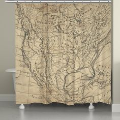 an old map shower curtain with the united states in black and white, on a gray wall