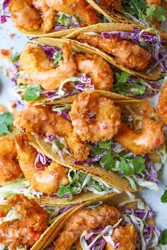 shrimp tacos with coleslaw and cilantro slaw