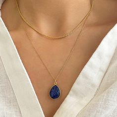 ✔️Genuine Raw Blue Sapphire Necklace✔️ A Stacking necklace with a Real Blue Sapphire Necklace and a Rope chain necklace A layered necklace you will love.   A Good Vibes Necklace to offer as a September Birthstone Necklace.   High-Quality Solid 925 Sterling Silver * Finish: Sterling Silver ∙ 24K Gold   Real Blue  Jewelry, Handmade in Greece.   This Sapphire necklace is great for wearing alone or for layering with other necklaces. Moreover, Blue Sapphire is a really powerful crystal that promotes Blue Pendant Necklace With Cable Chain, Dainty Blue Chain Jewelry, Elegant Blue Delicate Chain Necklace, Elegant Blue Necklace With Cable Chain, Blue Necklace With Adjustable Chain For Layering, Blue Dainty Jewelry With Cable Chain, Blue Dainty Cable Chain Jewelry, Blue Teardrop Pendant Jewelry With Adjustable Chain, Elegant Blue Clavicle Chain Necklace