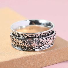 Embark on a journey of style and tranquility with our sterling silver spinner ring. With its delicately crafted engravings, this exquisite band ring is more than a piece of jewelry – it's a wearable work of art. Let your fingers find peace in the hypnotic spin of this elegant ring, destined to be your favorite fidget-friendly accessory. Flower Spinner, Silver Promise Rings, Sterling Silver Promise Rings, Fidget Rings, Silver Spinner Rings, Spinner Ring, Birthday Jewelry Gift, Spinner Rings, Elegant Ring