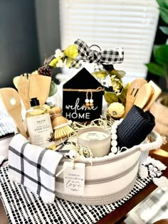 a basket filled with kitchen utensils on top of a table