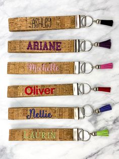 four personalized wine bottle openers with cork handles