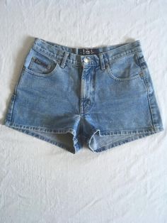 1990s women's blue jean shorts label- LEI 100% cotton zipper fly 5 pockets light wash  good vintage condition, light wear labeled size 5-see below measures, lying flat, waist-14 1/2" rise-10" inseam-2" hip-19 1/2" outseam-12 1/2" hem-12" Lei Jeans, Vintage Jean Shorts, 90s Jeans, Blue Jean Shorts, Short En Jean, Women's Summer Fashion, Jean Shorts, Short Outfits, Womens Shorts